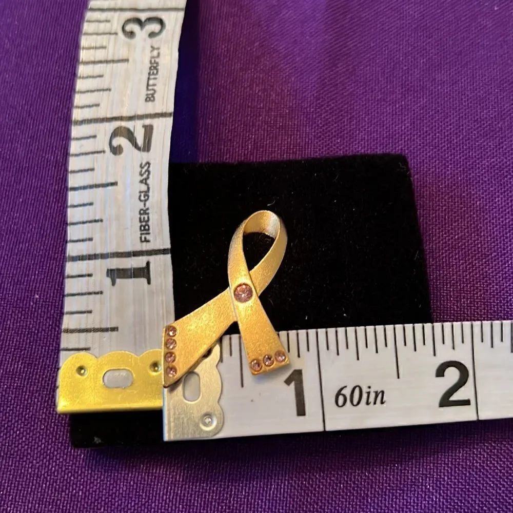 NWOT vintage Avon gold tone with pink  stones breast cancer ribbon pin